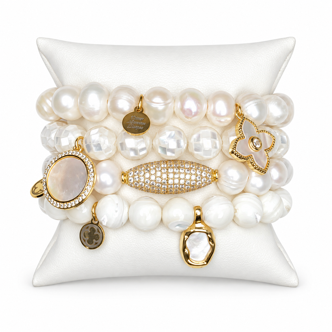 Perla Luxe Gold Armparty on white studio background