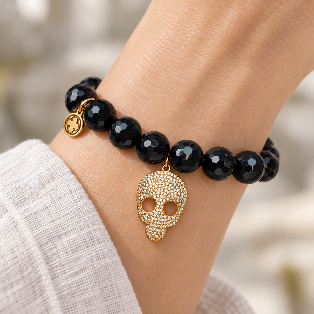 Black Onyx with Pavé Gold Skull worn on a woman&