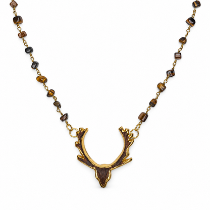 Tiger Eye Gemstone Chips Necklace with Reindeer Pendant studio photo