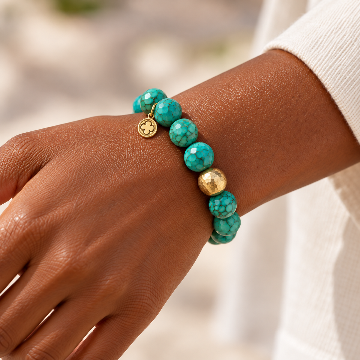 Green Turquoise with Hammered Gold Accent worn on a woman&