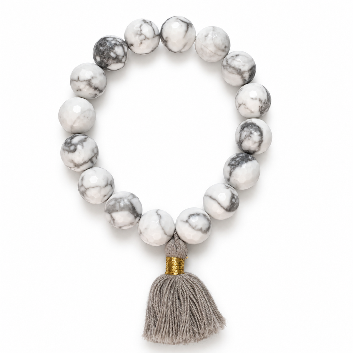 White Howlite with Taupe Tassel on a white background