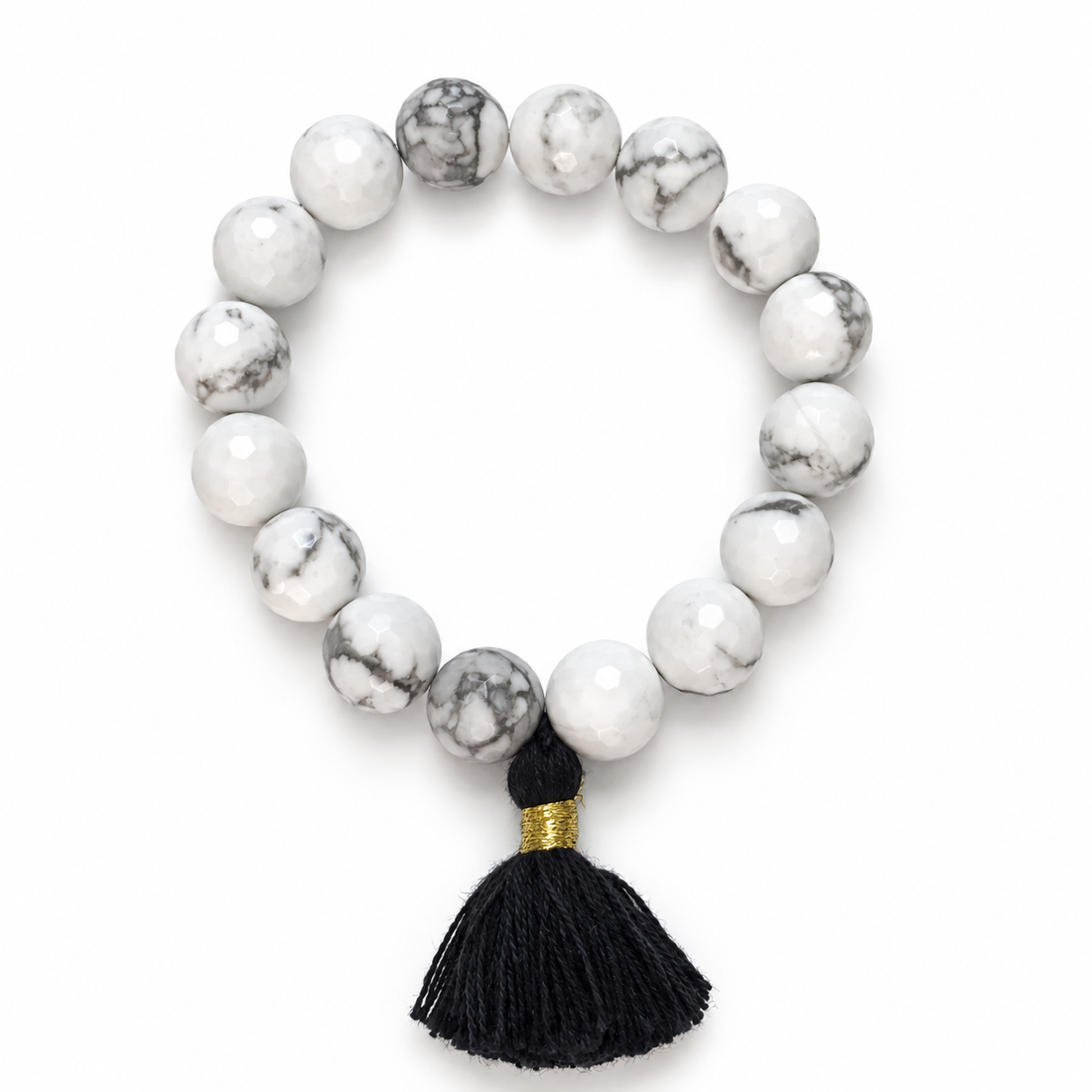 White Howlite with Black Tassel on a white background