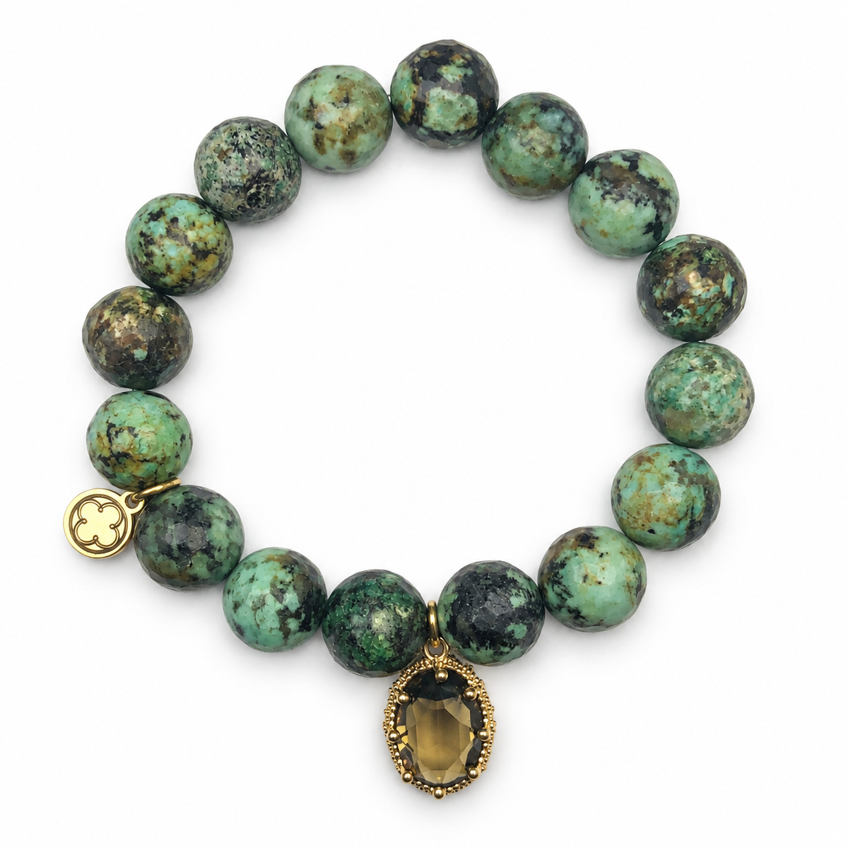 African Turquoise with Topaz Glass Teardrop on a white background