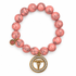 Coral Pink Howlite with Caduceus Staff of Hermes Pendant on a white background