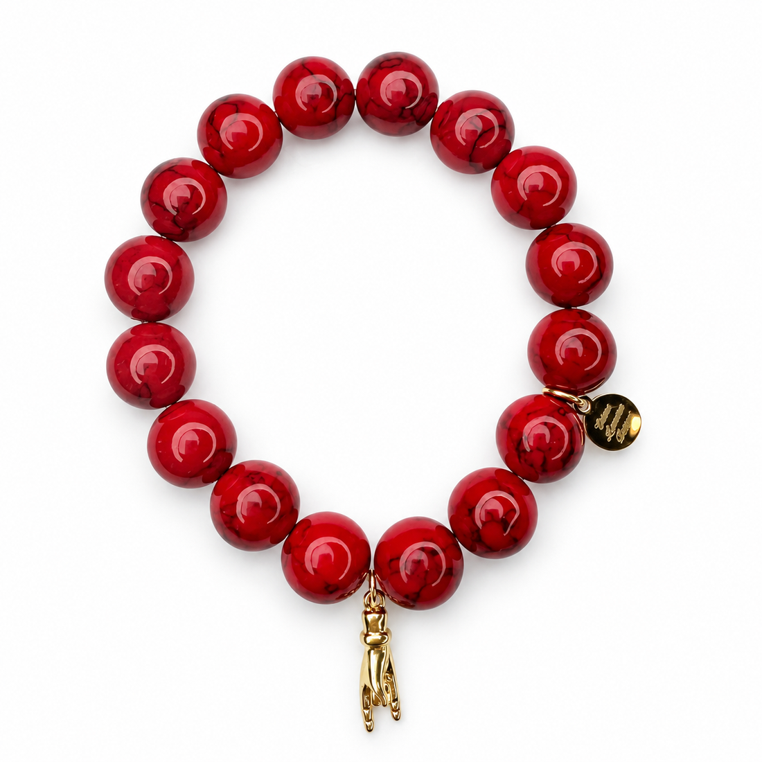 Red Howlite with Gold "Malocchio" Hand Pendant on white studio background