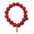 Red Howlite with Gold "Malocchio" Hand Pendant on white studio background