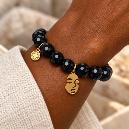 Black Onyx with Face Silhouette Pendant bracelet worn on a woman&