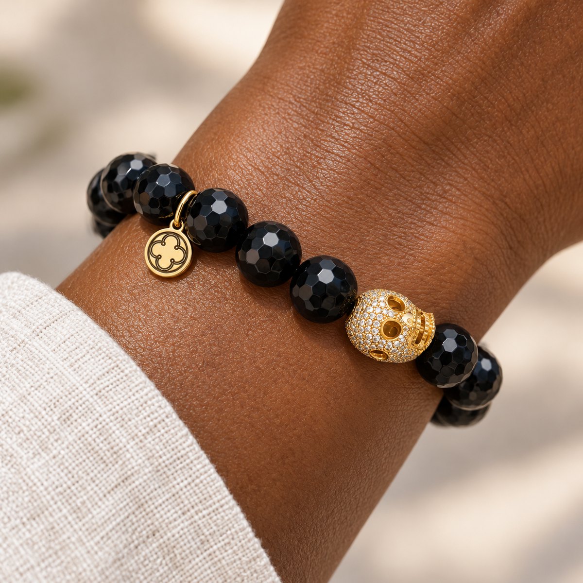 Black Onyx with Pavé Gold Skull worn on a woman&