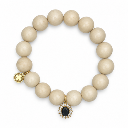 Beige Riverstone with Pavé Black Gold Crystal Star Pendant on a white background