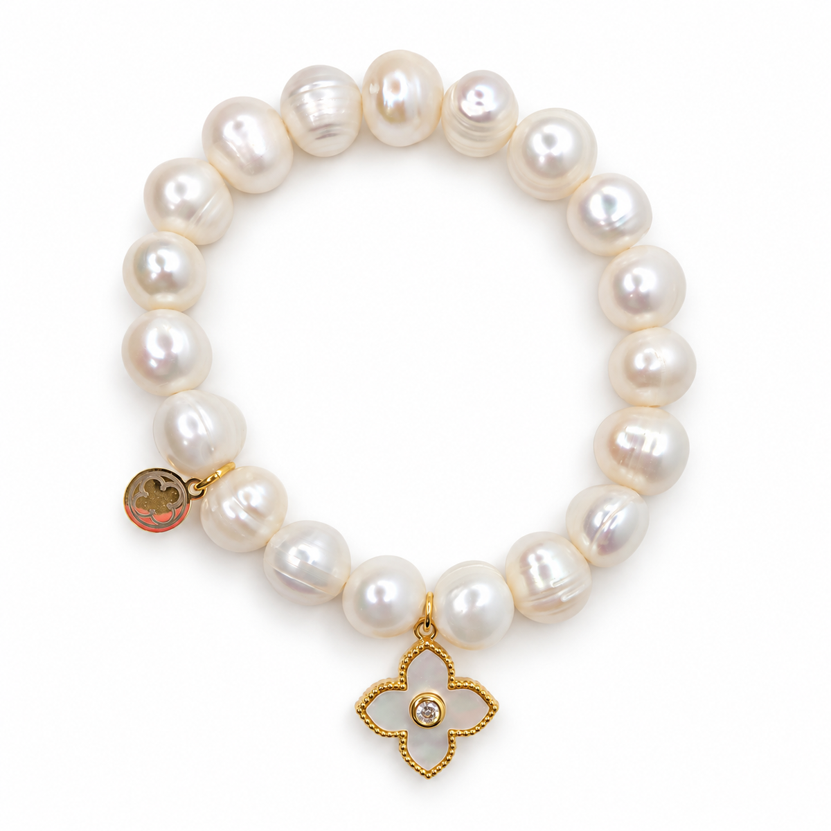 Freshwater Pearls with Mother of Pearl Pointed Clover on white studio background