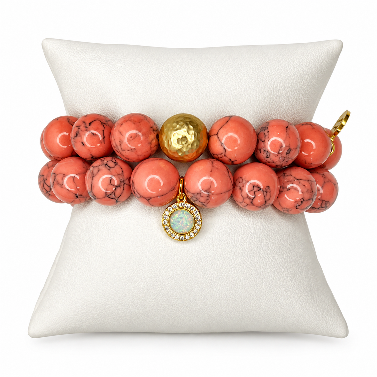 Coral Pink Howlite Color Stax on a white studio background