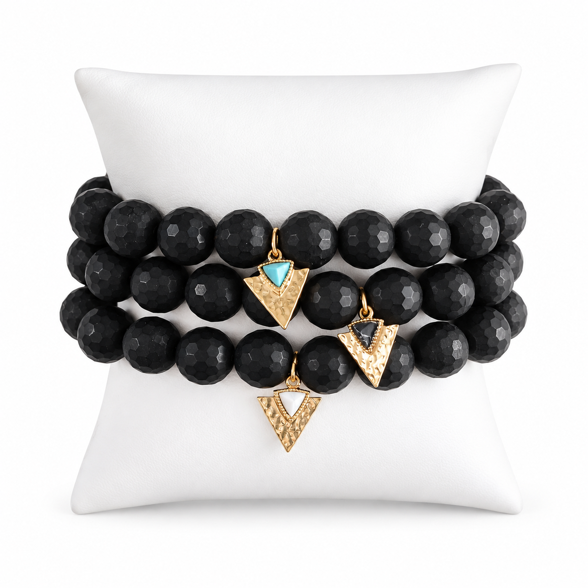 Matte Black Onyx Color Stax bracelet set on white display pillow