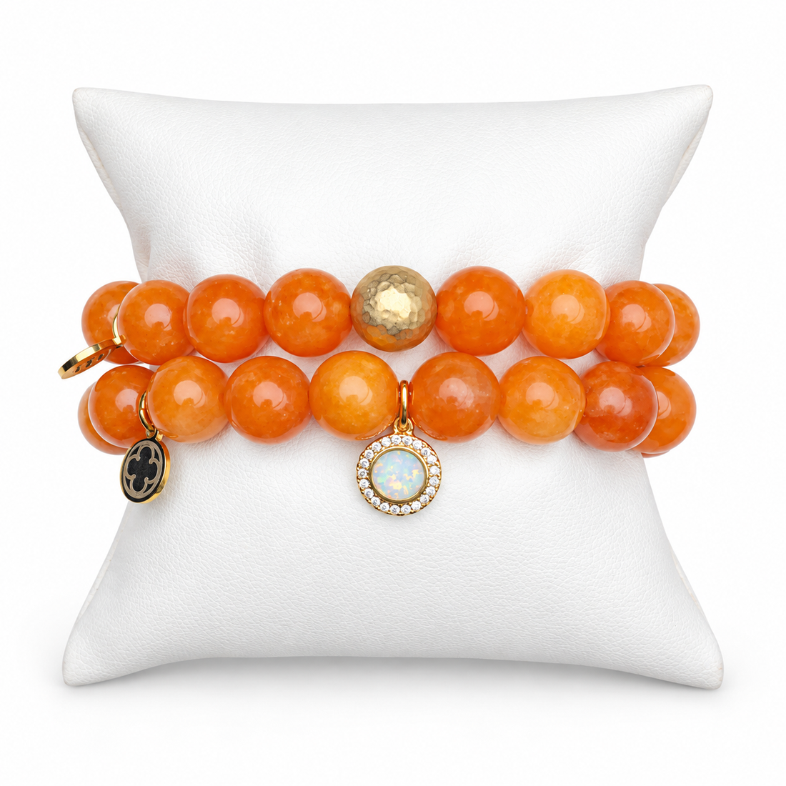 Orange Jade Color Stax bracelet set on white display pillow