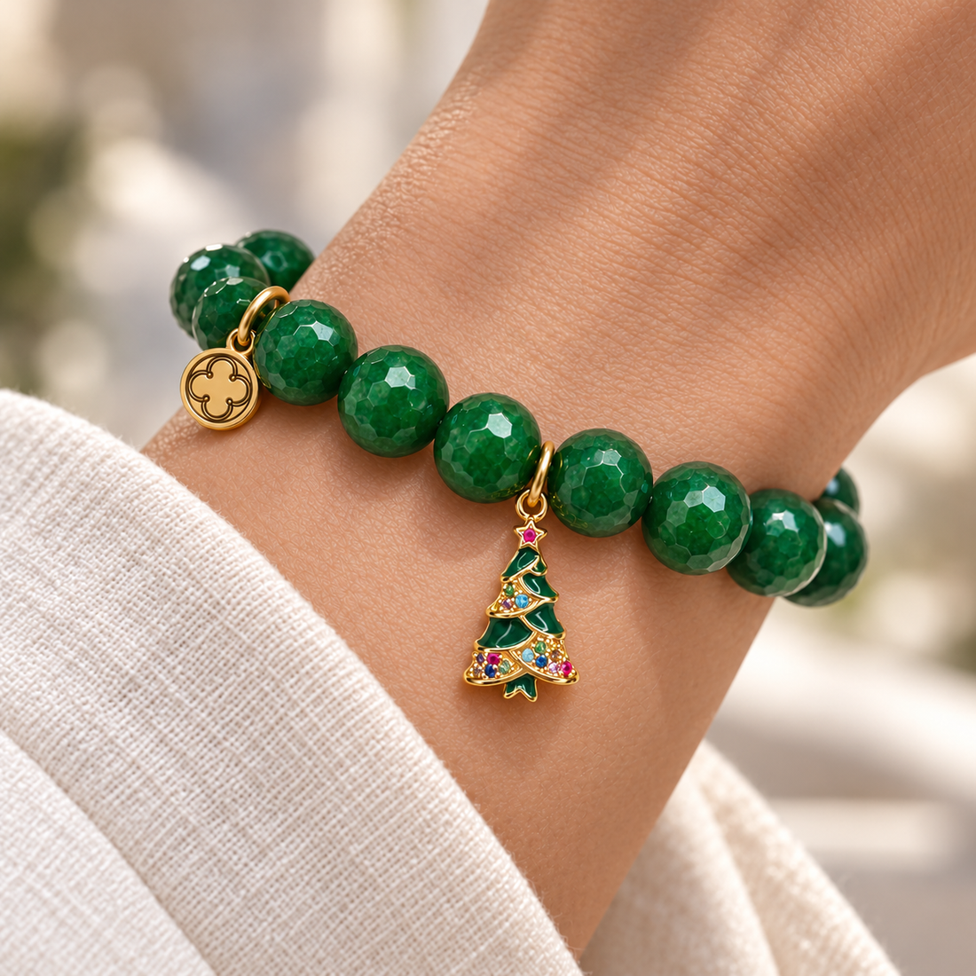 Deck The Halls Emerald Green Jade with Christmas Tree Pendant on a woman’s wrist