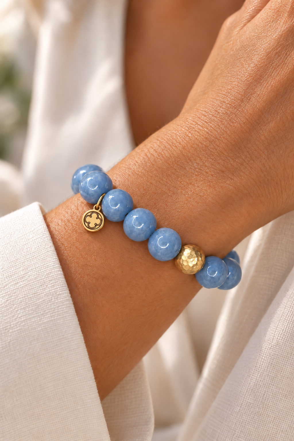 Angelite with Hammered Gold Accent worn on a woman&