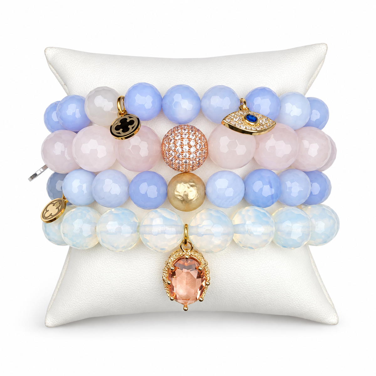 Serenity and Rose Quartz Armparty on white studio background