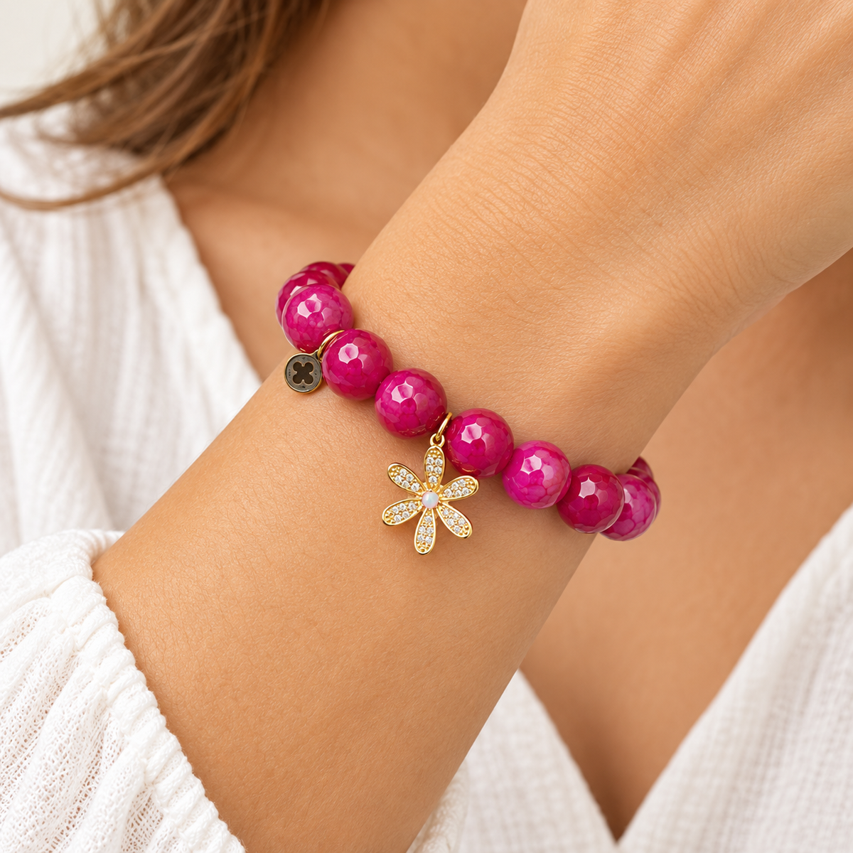 Flower Power Magenta Jade bracelet worn on a woman&