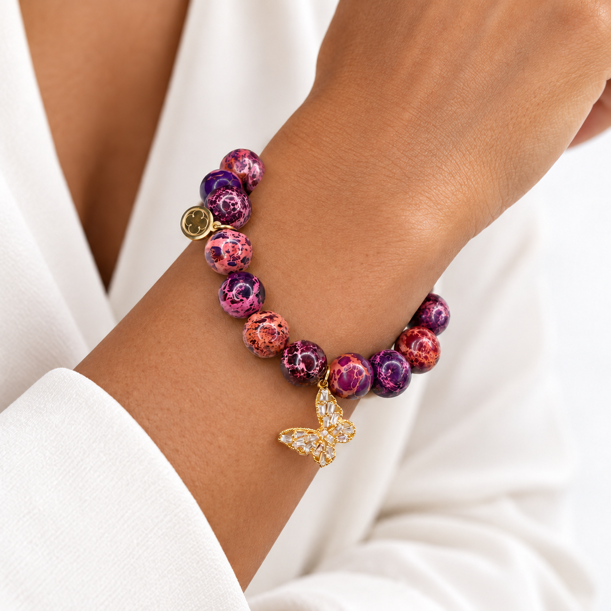 Spread Your Wings and Fly Purple Jasper bracelet on a woman&