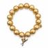 Hammered 22k Gold Plated Brass with Ski Blades Pendant — Oriana LaMarca