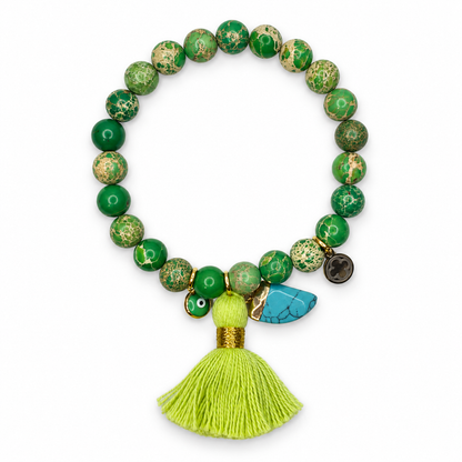 Green Imperial Jasper with Lime Green Tassel and Turquoise Horn Pendant on white studio background