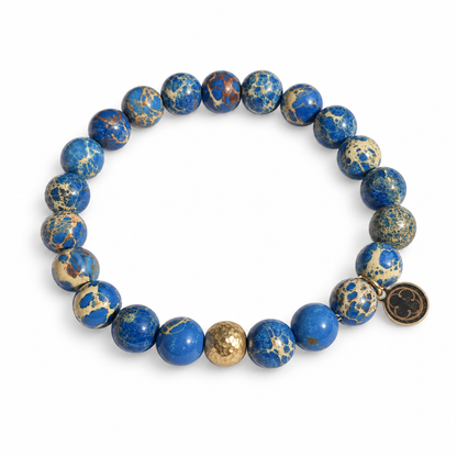 Blue Imperial Jasper with Hammered Gold Accent on white studio background