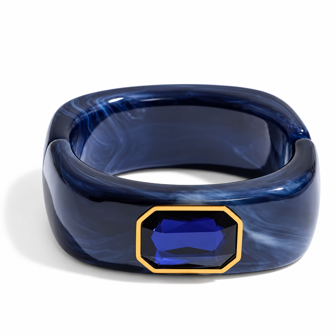Isabella Sapphire Acrylic Bangle on a clean studio background