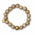 Sand Ceramic Riccio Bead with Hammered Gold Accent on white studio background