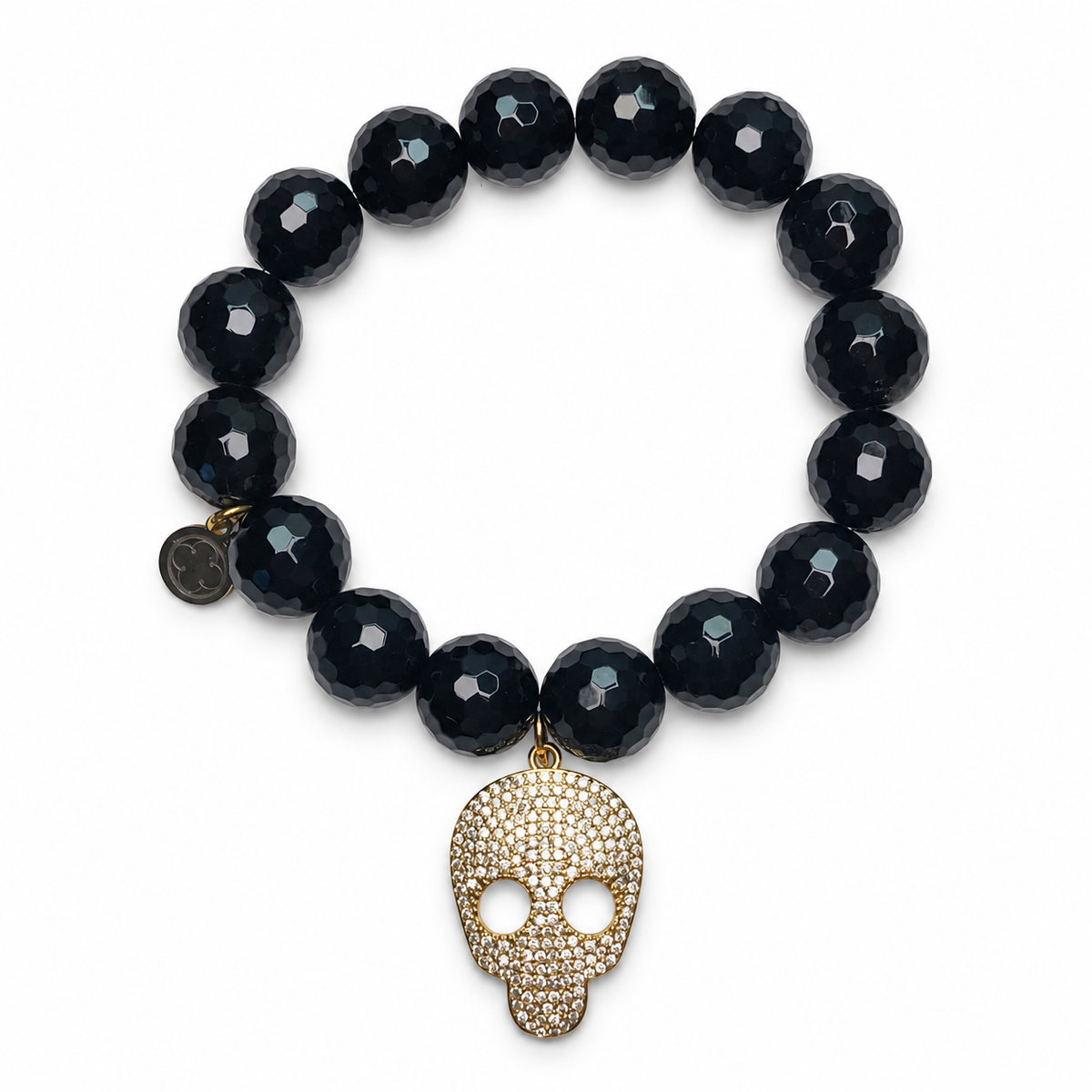 Black Onyx with Pavé Gold Skull on white studio background