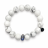 White Howlite with Blue Baby Shoe Accent Bead on white studio background