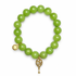 Lime Green Jade with Gold Pavé Tennis Racket on white studio background