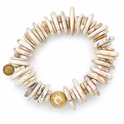 White Magnesite Slices with Hammered Gold Accent on white studio background