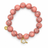 Coral Pink Howlite with Pickleball Paddle on white studio background