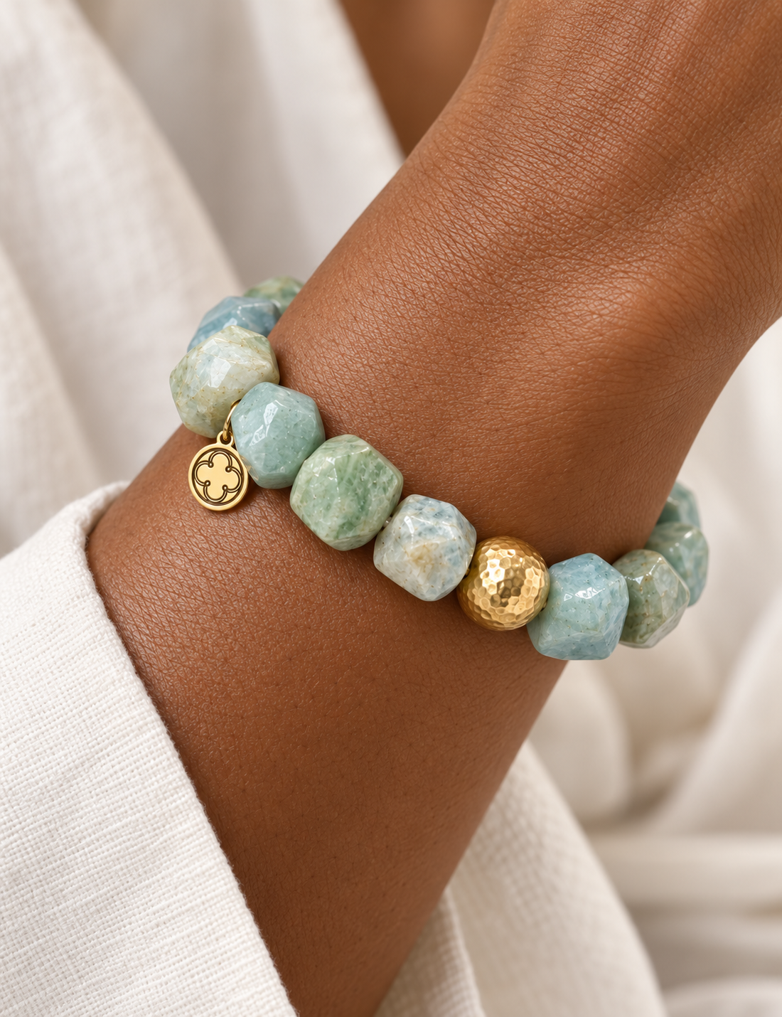Aquamarine Nugget with Hammered Gold Accent worn on a woman&