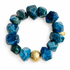 Blue Apatite Nugget with Hammered Gold Accent on white studio background