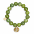 Green Garnet with Gold Pavé World on white studio background