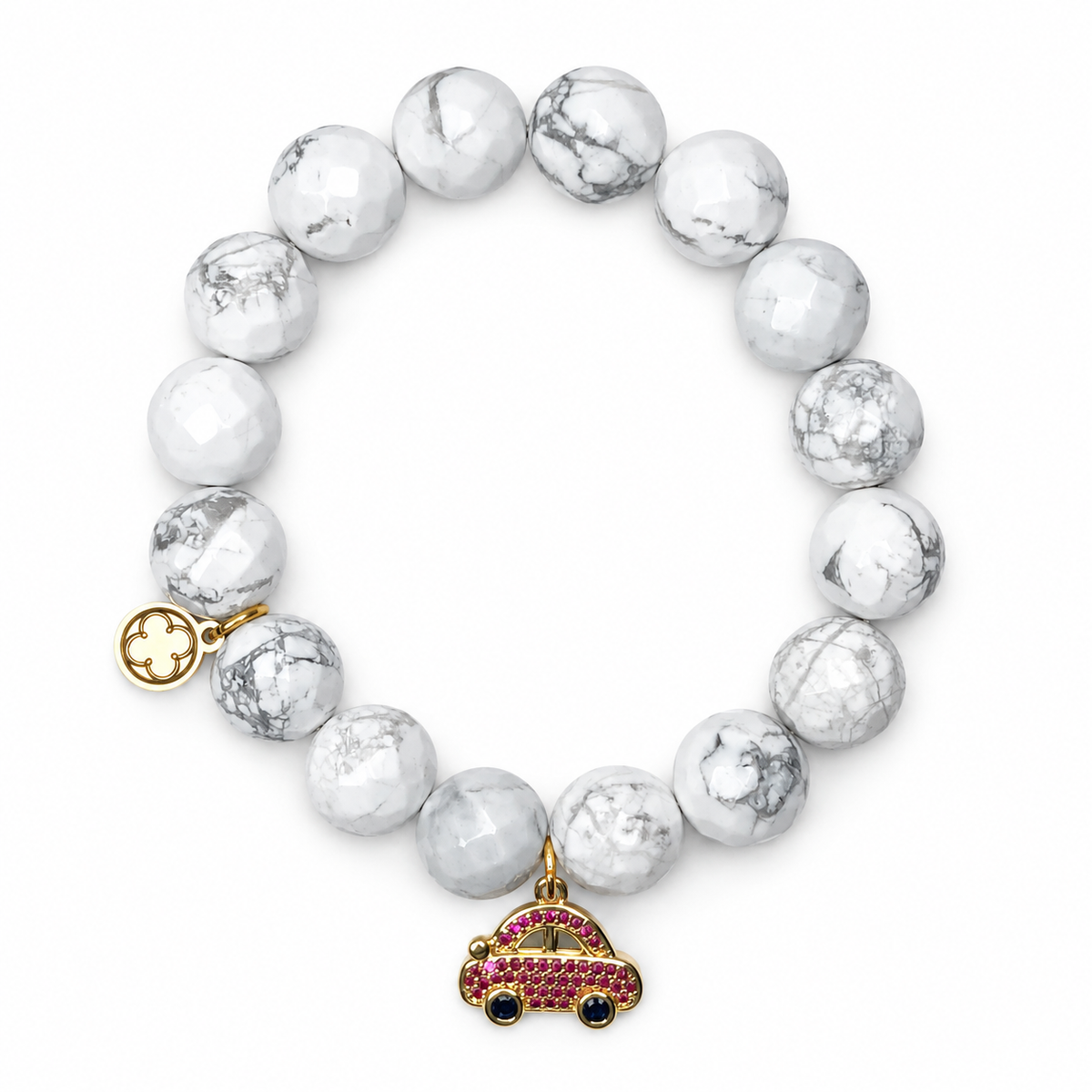 White Howlite with Gold Pavé Fiat on white studio background