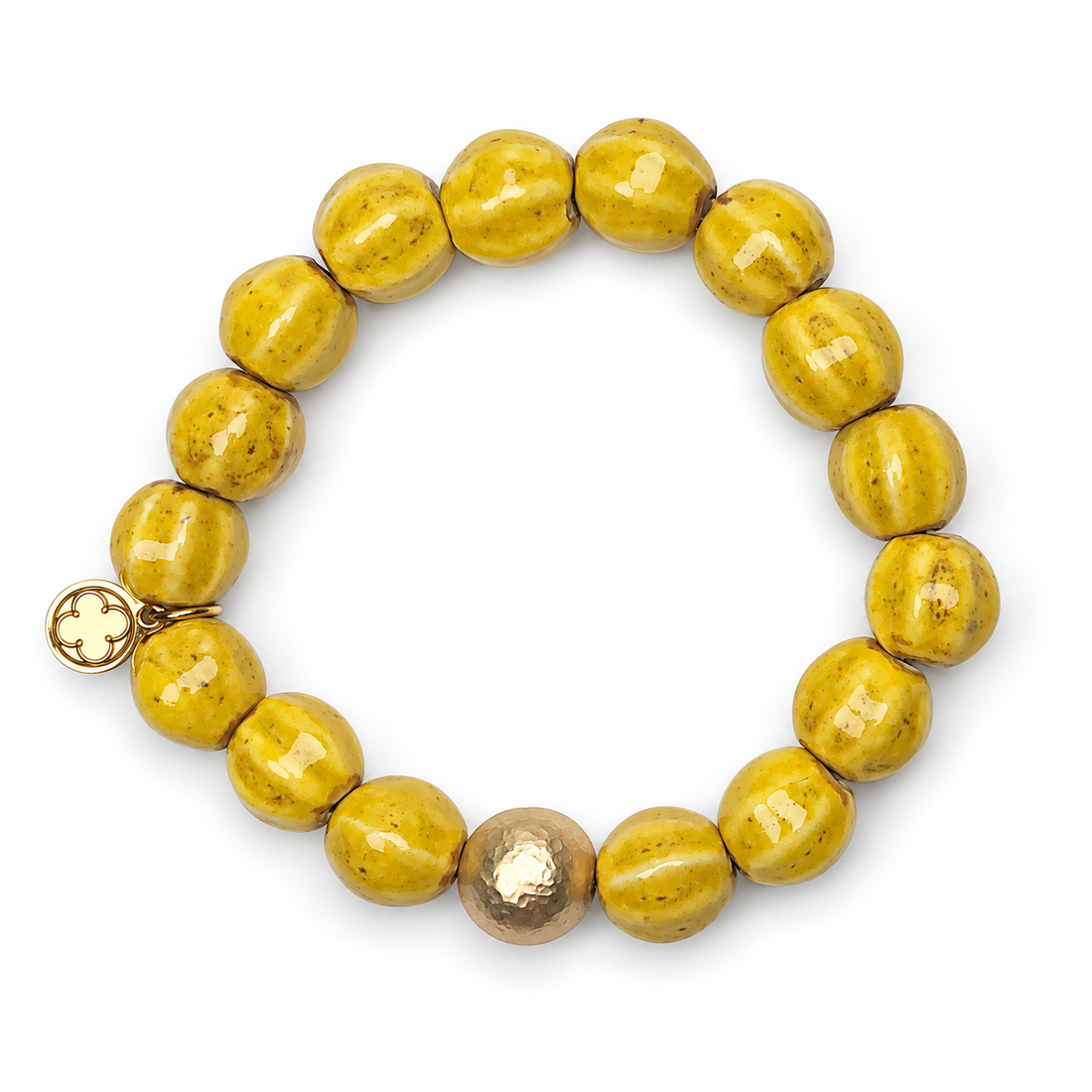 Yellow Ceramic Riccio Bead with Hammered Gold Accent on white studio background