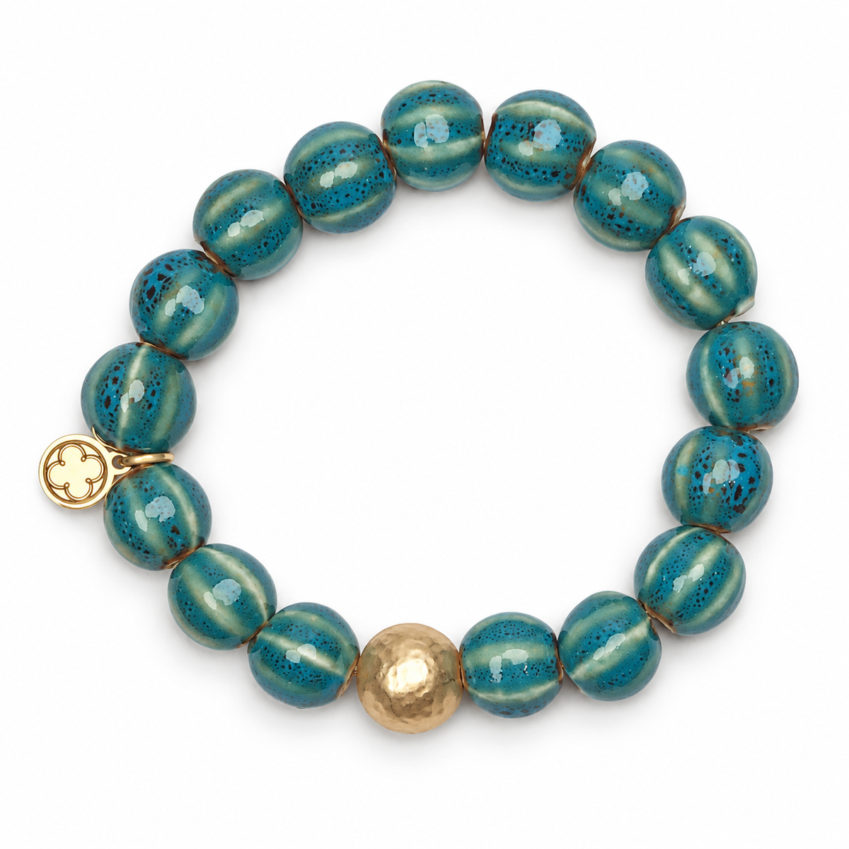 Turquoise Ceramic Riccio Bead with Hammered Gold Accent on white studio background