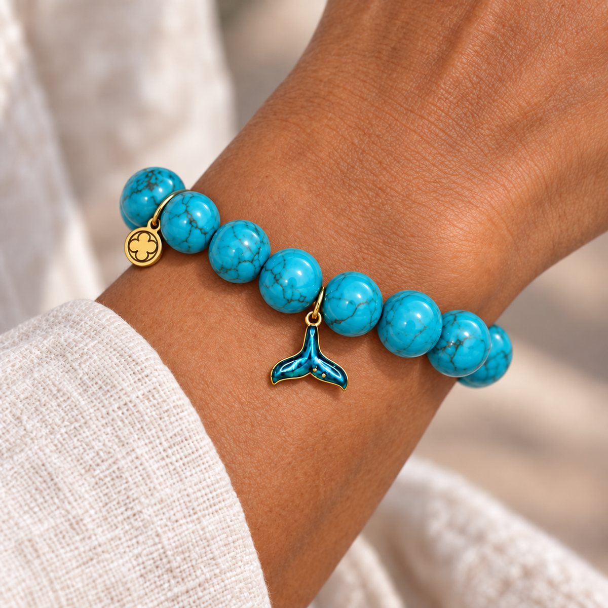 Blue Howlite with Mermaid Tail Pendant worn on a woman&