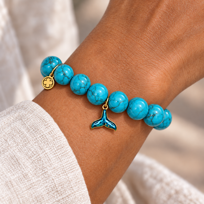 Blue Howlite with Mermaid Tail Pendant worn on a woman&