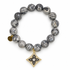 Mr Jasper Grey with Pavé Harlequin Gold Clover Pendant on white studio background