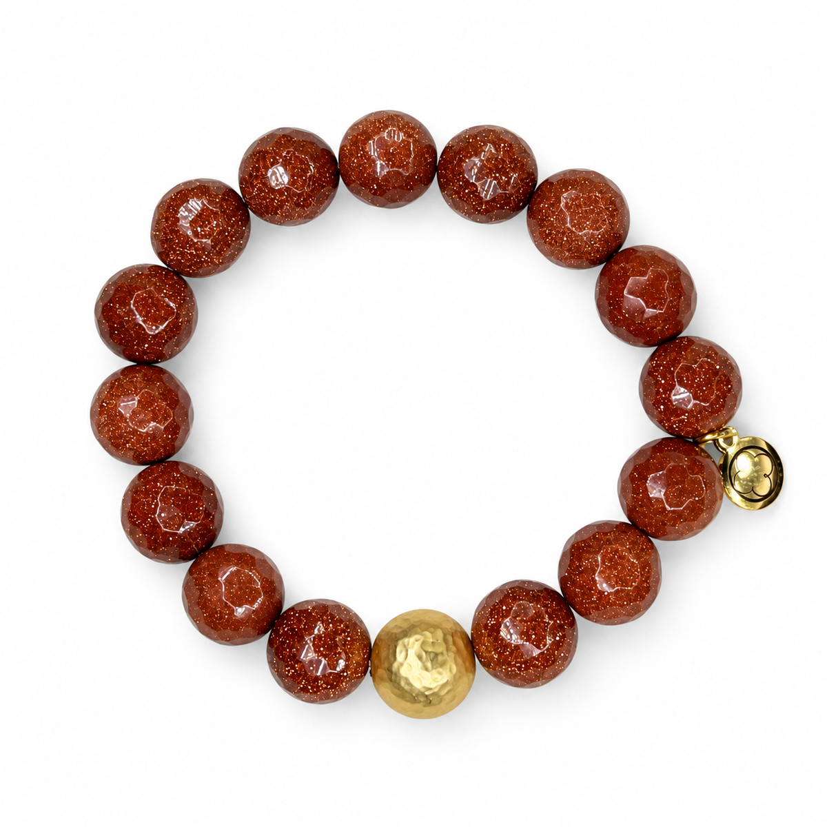 Goldstone with Hammered Gold Accent on white studio background