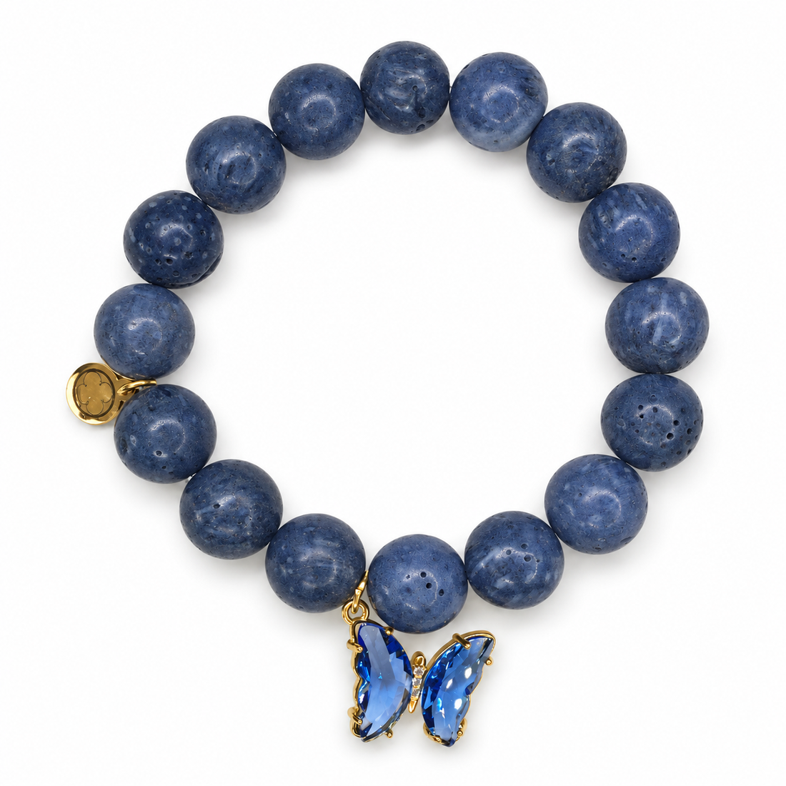 Blue Sponge Coral with Glass Butterfly Pendant on white studio background
