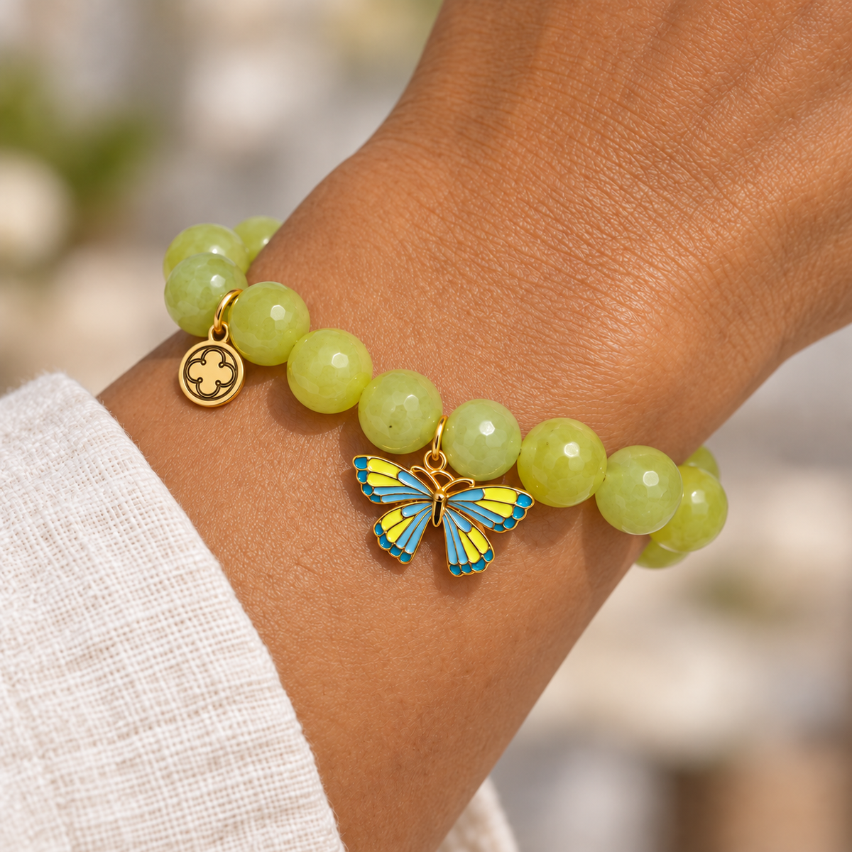 Celery Jade with Camellia Yellow/Blue Butterfly Pendant worn on a woman&