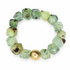 Green Quartz Nugget with Hammered Gold Accent on white studio background