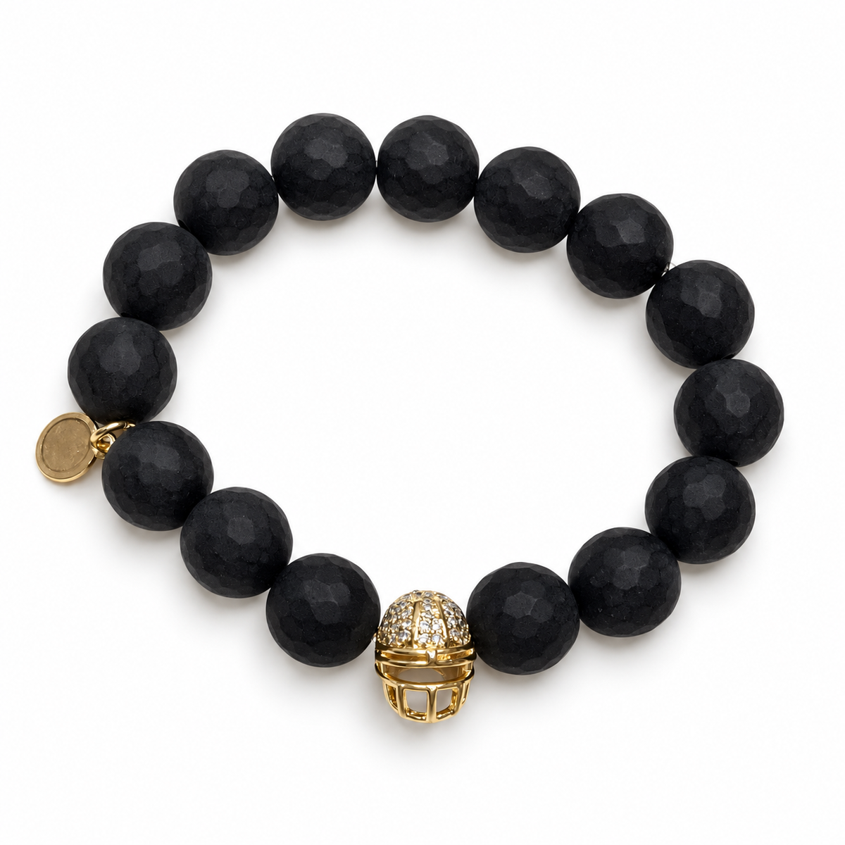 Matte Black Onyx with Pavé Gold Helmet on white studio background