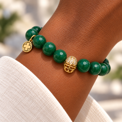 Emerald Green Jade with Pavé Gold Helmet on a woman’s wrist