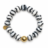 Tibetan Black Wave Agate with Gold Hammered Accent on a white background