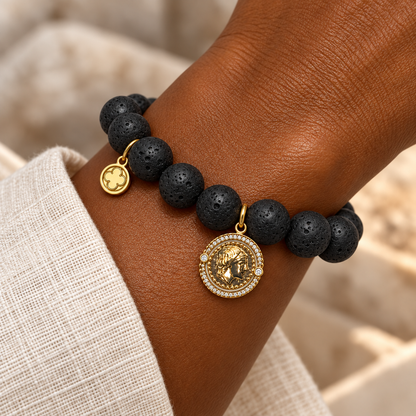 Black Lava with Roman Coin bracelet worn on a woman&