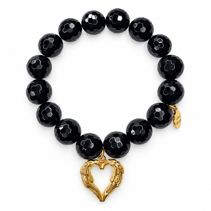 Black Onyx with Gold Heart Angel Wings on white studio background